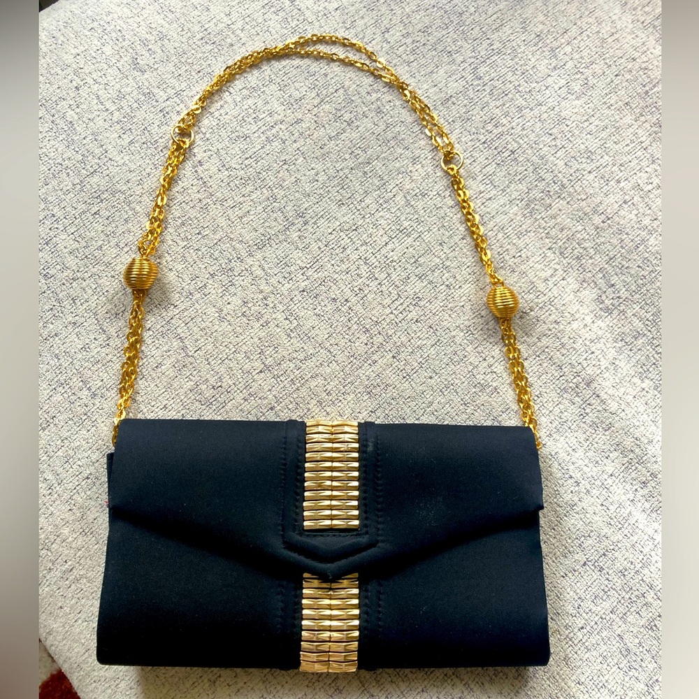 Black Clutch with Gold Accents 💼✨